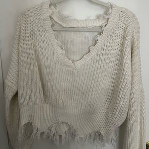white distressed sweater